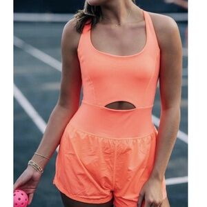 FREE PEOPLE Movement Righteous Runsie in Neon Coral Size small